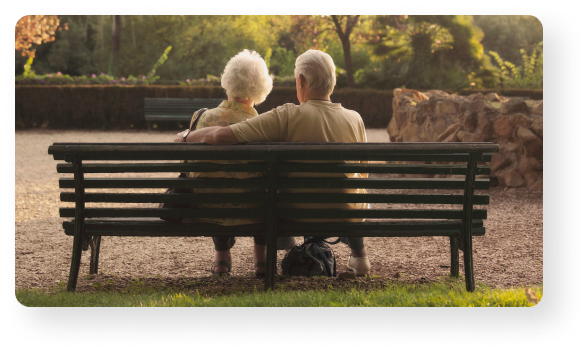 Two people sitting on a bench